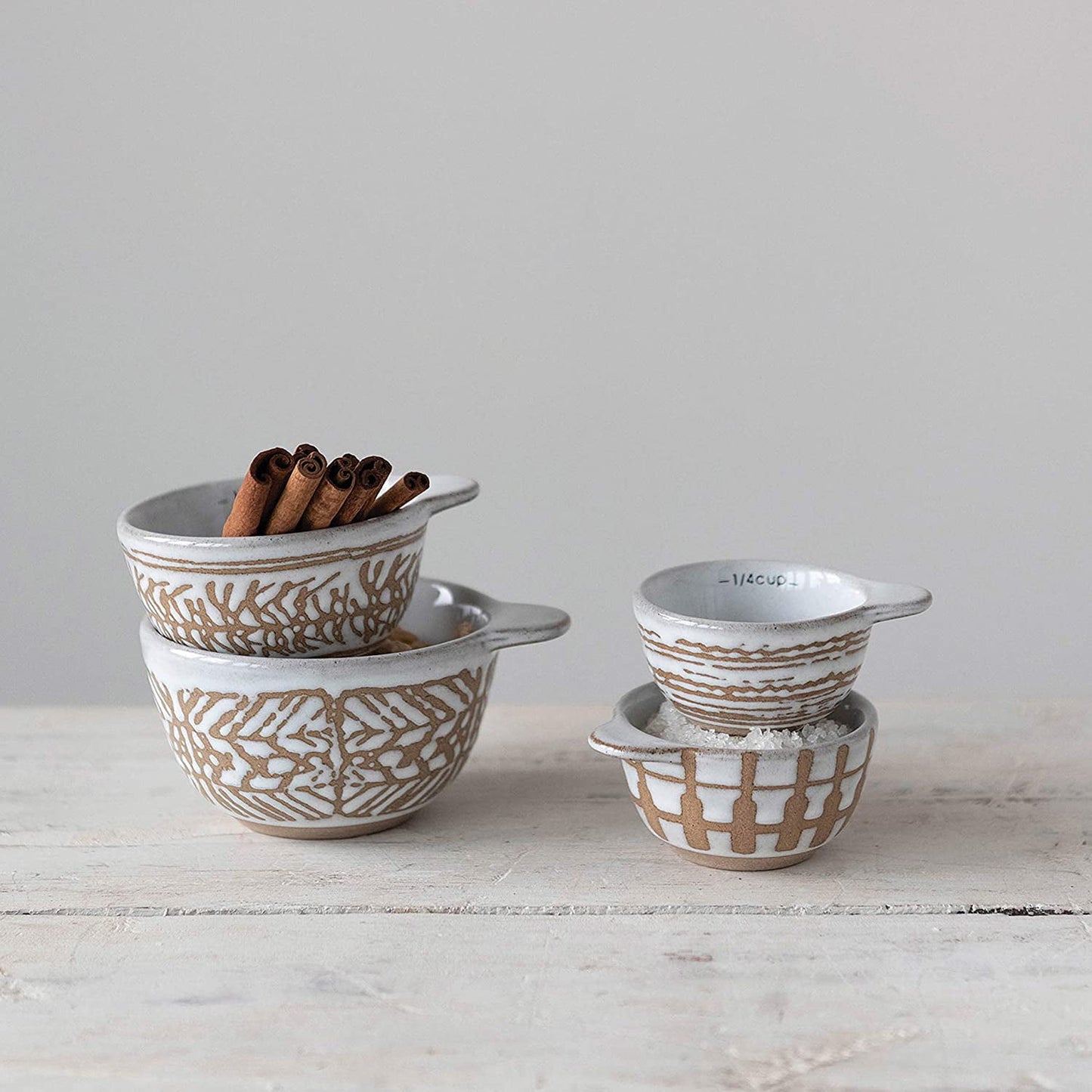 Creative Co-Op Stoneware Measuring Cups with Wax Relief Pattern, White, Set of 4