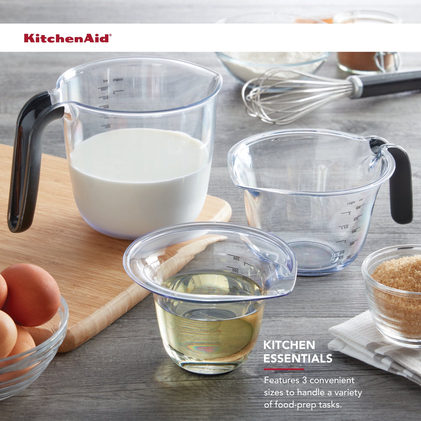 Kitchenaid Universal Clear Plastic Set of 3 Nesting Measuring Cups with Black Handle