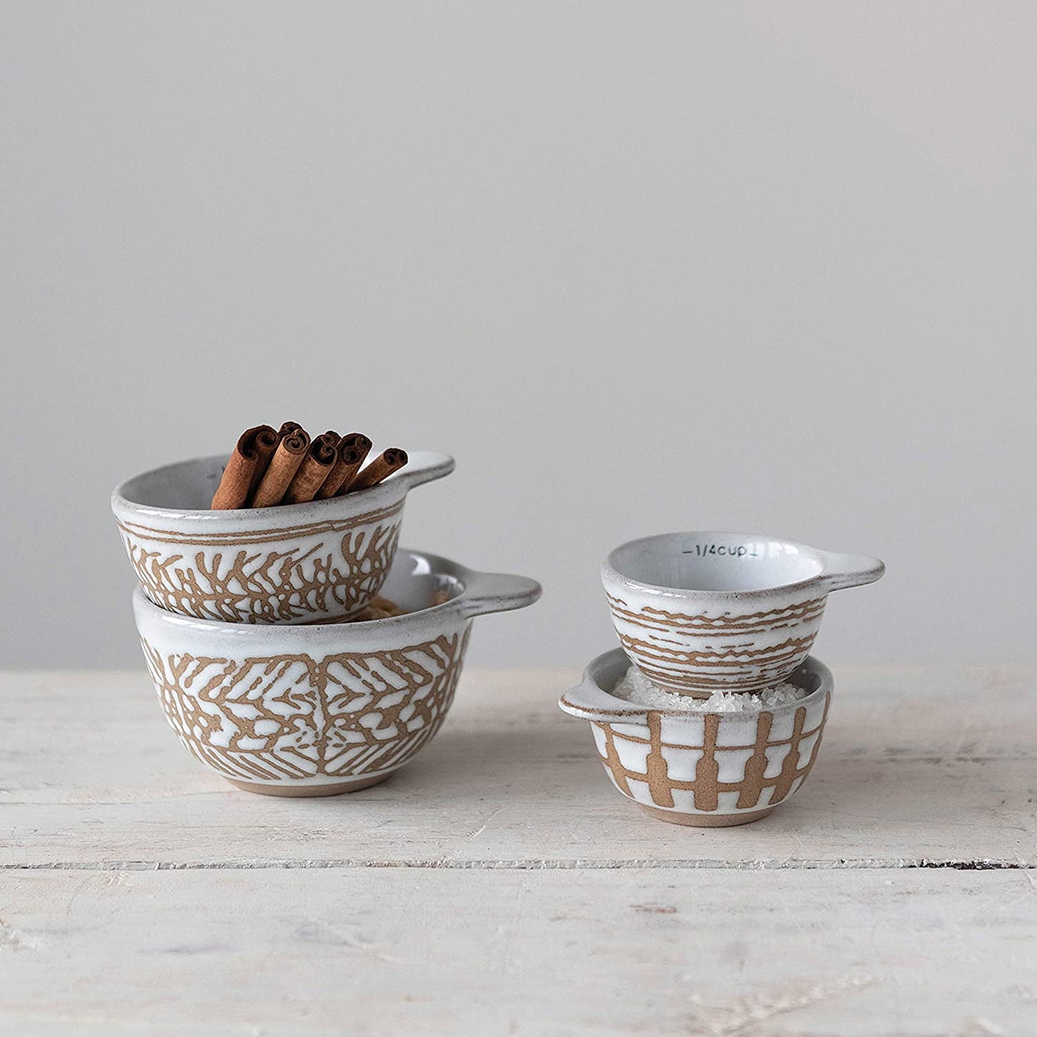 Creative Co-Op Stoneware Measuring Cups with Wax Relief Pattern, White, Set of 4