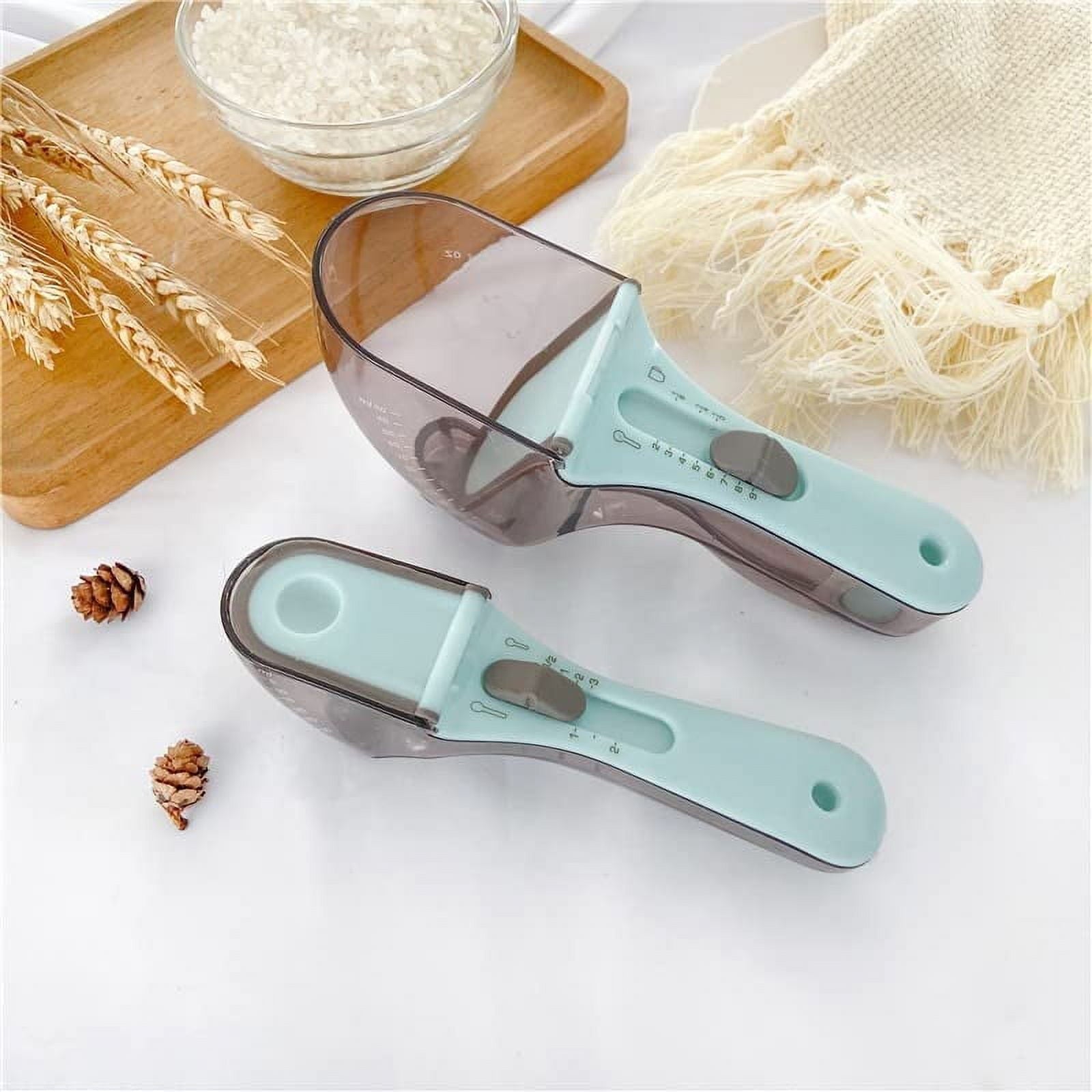 2 Pcs Plastic Measuring Spoon Set for your kitchen spoons for all kind of measuring Magnetic back to help stay on your fridge Adjustable easy to use Precise measuring, and convenient - Small& Large