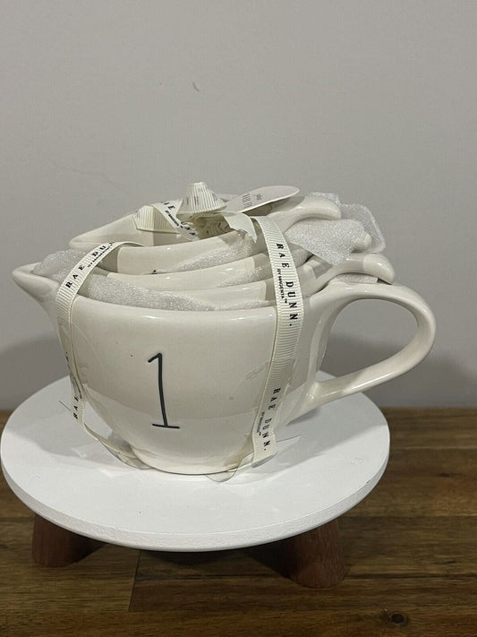 Rae Dunn Measuring Cup set Ivory Ceramic includes 1-cup , 1/2-cup, 1/3- cup, 1/4-cup handles Black LL letters