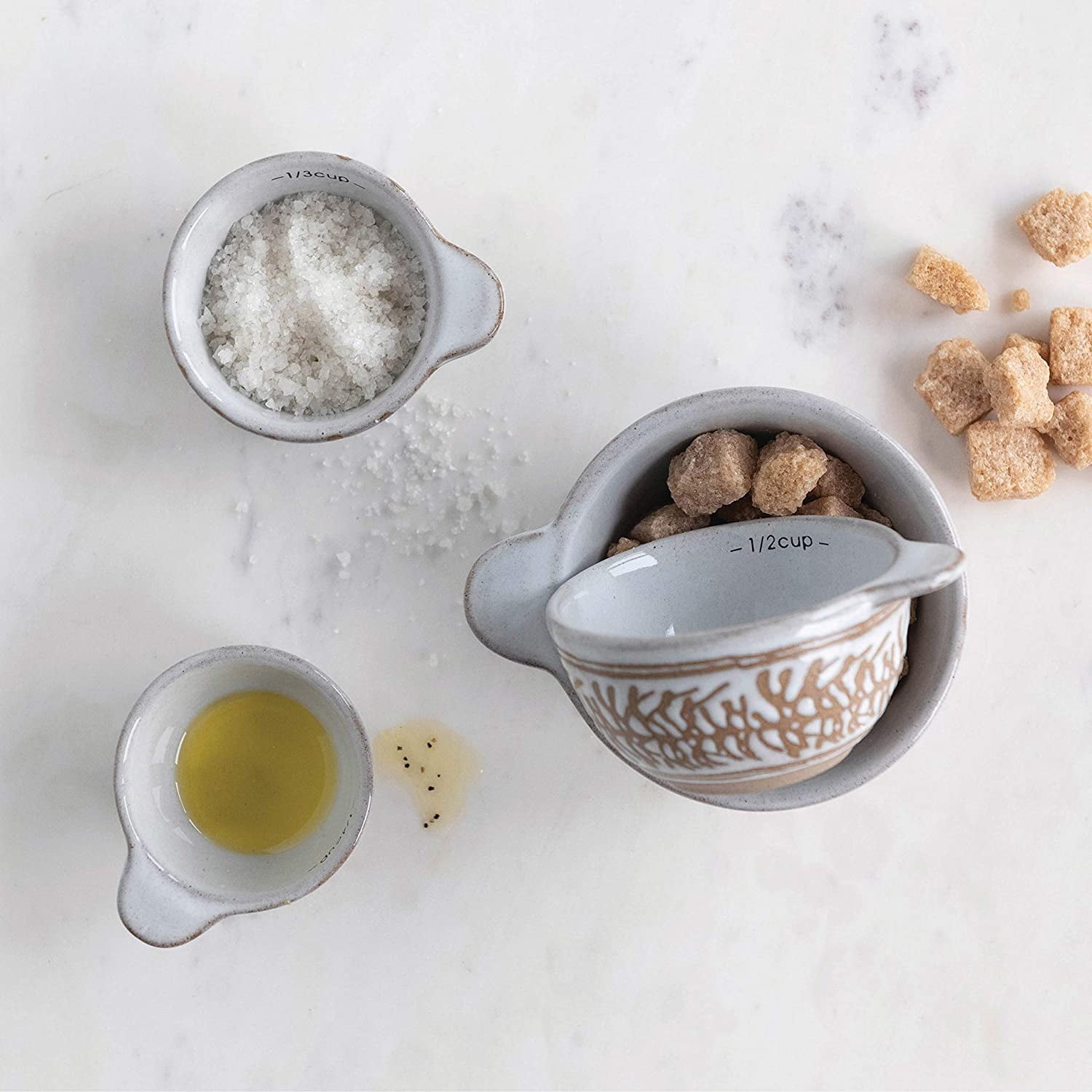 Creative Co-Op Stoneware Measuring Cups with Wax Relief Pattern, White, Set of 4