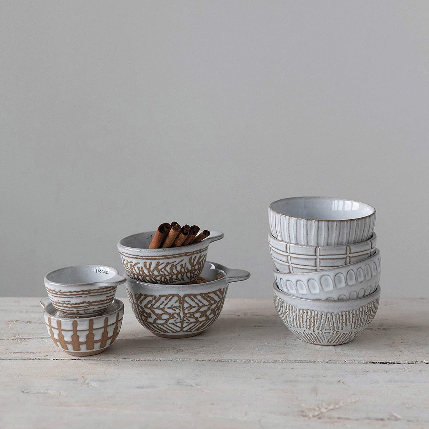Creative Co-Op Stoneware Measuring Cups with Wax Relief Pattern, White, Set of 4
