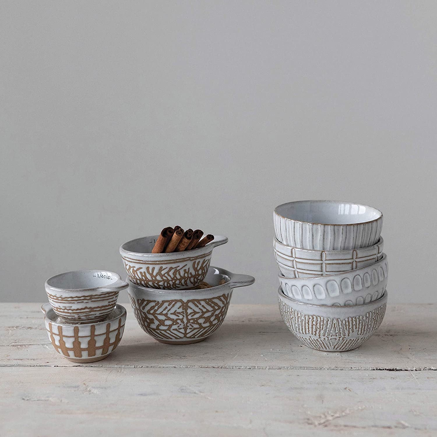 Creative Co-Op Stoneware Measuring Cups with Wax Relief Pattern, White, Set of 4